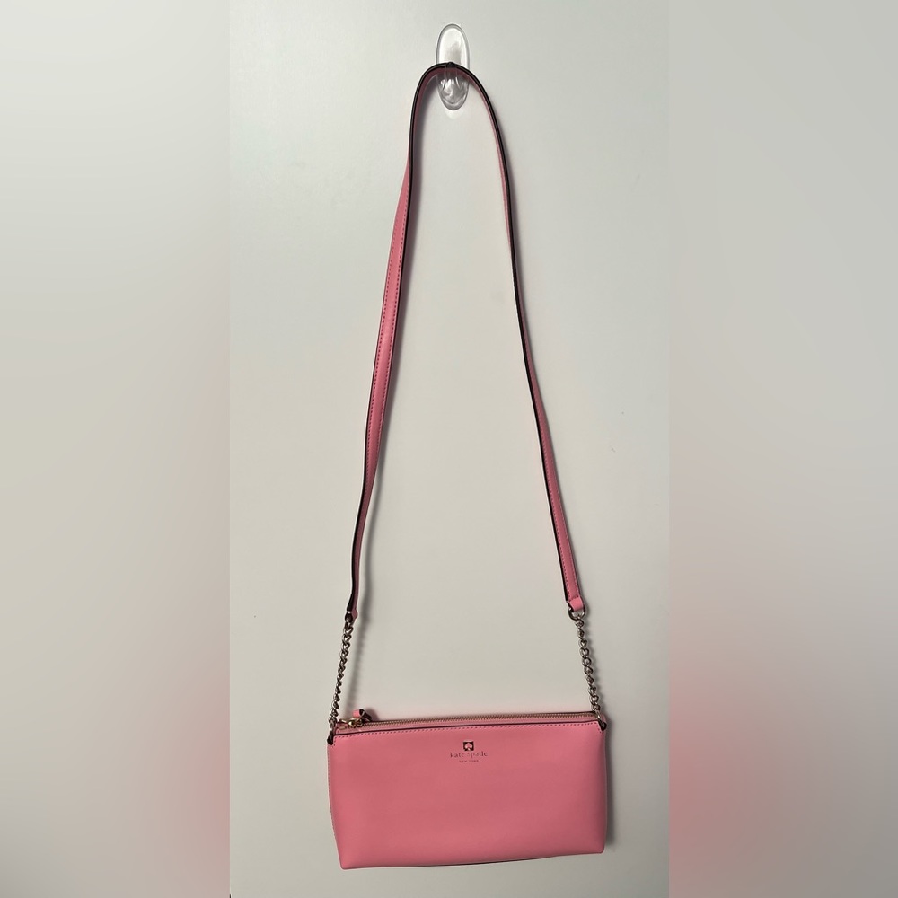 Light pink small Kate Spade Leather purse.